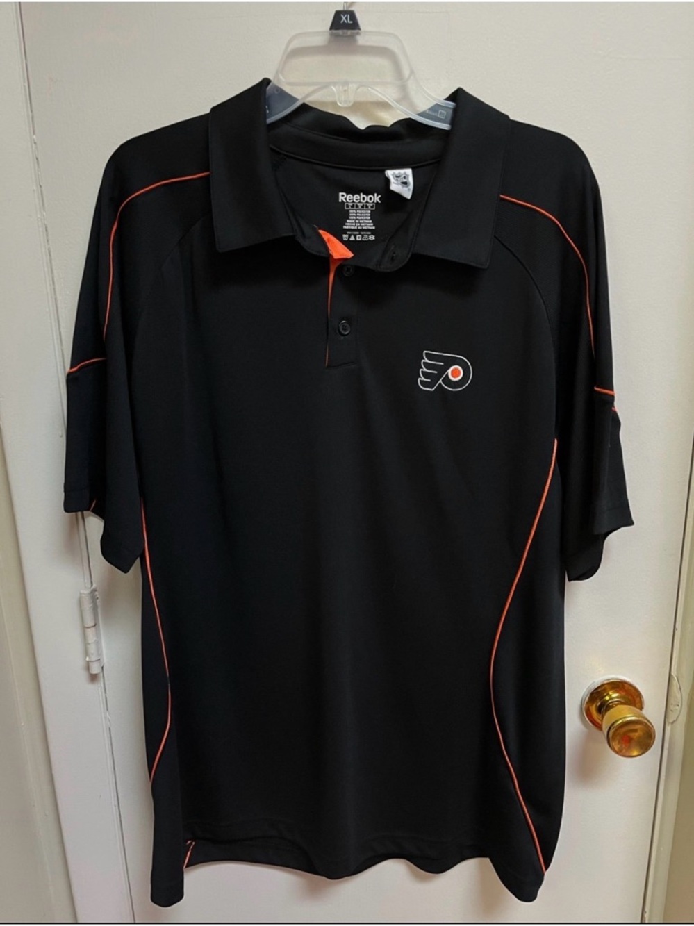 Reebok Black Polo with Orange Accents and Flyers Logo